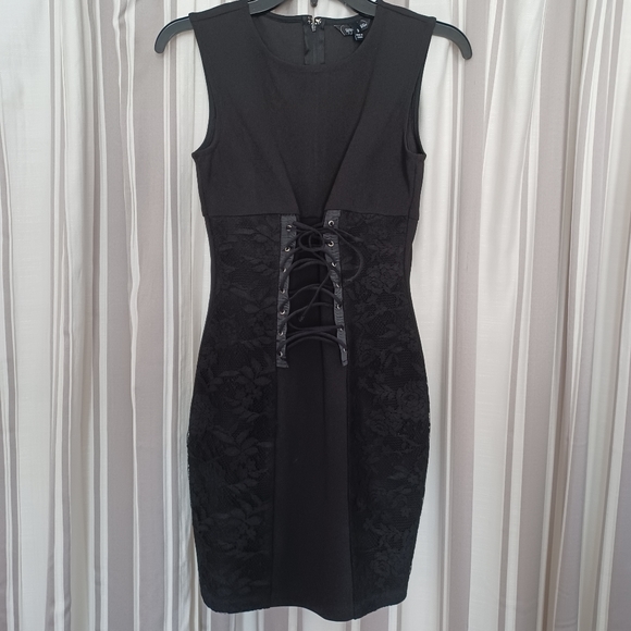 Black mini that laces up in front. - Picture 1 of 3